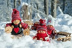 doll figures characters wooden nature fun cute snow stock photo