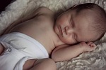 baby sleep small infant son little sleepy newborn stock photo