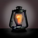 lantern lamp filament lightbulb mood light darkness oellampe stock photo