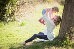 park mother girl nature mama child toddler happy stock photo