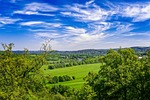 field landscape nature germany clouds countryside hills stock photo