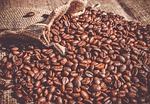 coffee beans roasted caffeine brown bag linen sack stock photo