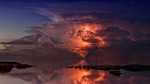 thunderstorm ocean lightning twilight clouds coast sky nature stock photo
