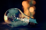 light bulb idea bokeh energy glass power stock photo
