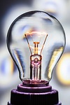 light bulb incandescent electricity tungsten source filament glass stock photo