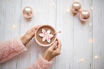 pink christmas hot chocolate cozy flat lay xmas stock photo