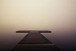 pier fog lake dock wooden jetty sea ocean stock photo
