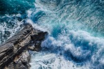 sea wave storm cliff nature wet landscape blue stock photo