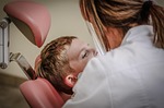 dentist dental care patient doctor check up examination stock photo