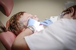 dentist patient dental care medical oral hygiene chair stock photo