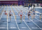 running hurdles athletics competition athlete stock photo