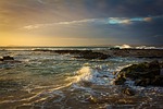 beach waves sea ocean rocky sunset spume nature stock photo
