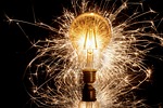 sparkler lightbulb spray candle spark star splatter bright stock photo