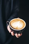 the coffee capuchino hot dark drink hand stock photo