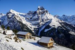 winter mountain alps cottage ski nature travel exploration stock photo