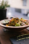 vegan meal dinner salad healthy restaurant yummy enjoy stock photo