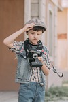 camera boy little kid old fashion vintage stock photo