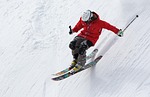 man skier ski skiing snow slopes extreme sports stock photo