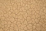soil cracks clay earth dry desert ground dirt stock photo