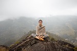 meditate meditation woman mountains nature relax calm yoga stock photo