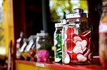 candies jars candy assorted glass sweets heart shaped stock photo