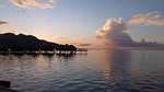 horizon water sunset ocean reflection tahiti nature clouds stock photo