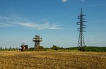 field meadow nature towers sky mast rigging rope stock photo
