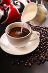 coffee milk beans cup of pouring cream caffeine stock photo
