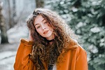 woman female girl portrait model young curly hair stock photo