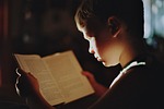 boy book reading literature read education study studying stock photo