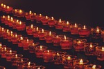 tea lights candles flame candlelight lighting sacrificial religion stock photo