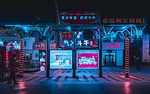 cyberpunk street city platform lights signage stores shops stock photo