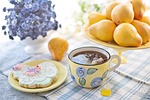 tea biscuit still life cookie pears fruit teacup stock photo