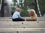 baby teddy bear play toy cute child small stock photo