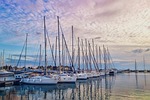 marina sailboats harbor sunset yachts sea sailing nautical stock photo