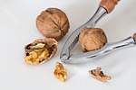 walnuts nutcracker crack stock photo
