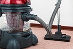 vacuum cleaner carpet housework housekeeping appliance electrical chores stock photo
