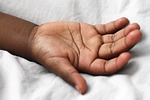 hand black skin child stock photo