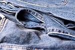 jeans denim pants clothing fashion blue material texture stock photo