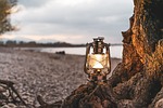 lantern sea heaven beach water clouds tree riverbank stock photo