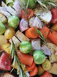 vegetables herbs food onions potatoes carrots rosemary brussel stock photo