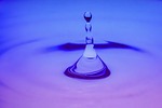 waterdrop macro water nature purple blue splash waves stock photo