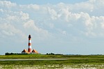 lighthouse ebb beach nature coast beacon stock photo