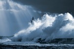 storm ocean waves clouds sea lighthouse hurricane shore stock photo