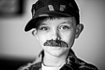 boy fake mustache portrait child kid black and stock photo