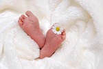 feet baby birth child blanket newborn born infant stock photo