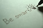 smart be clever mindset bulb light bright write stock photo