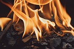 fire flames money grilling hot stock photo