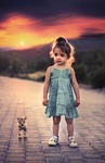 girl sad standing pet child toddlers worried portrait stock photo