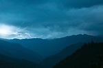 lightning storm sky cloud mountain nature outdoor wilderness stock photo
